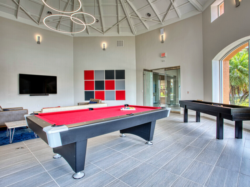 This image shows the Clubhouse with complimentary coffee, billiards, and Shuffleboard.