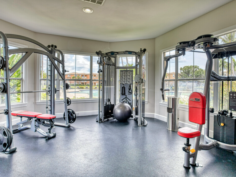 This image showcases commercial fitness with a State-of-the-art 2-level athletic club with Matrix Series 7xi equipment that is essential for community amenities. Offering different weight of kettlebells that is good for point gravity off-centered.